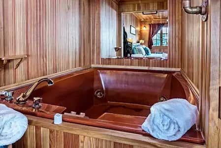 Private in-room jacuzzi at Whistling Winds Motel