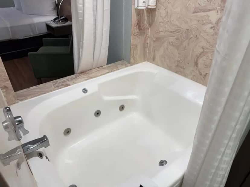 In-room hot tub at Wingate by Wyndham Livonia in Livonia, MI