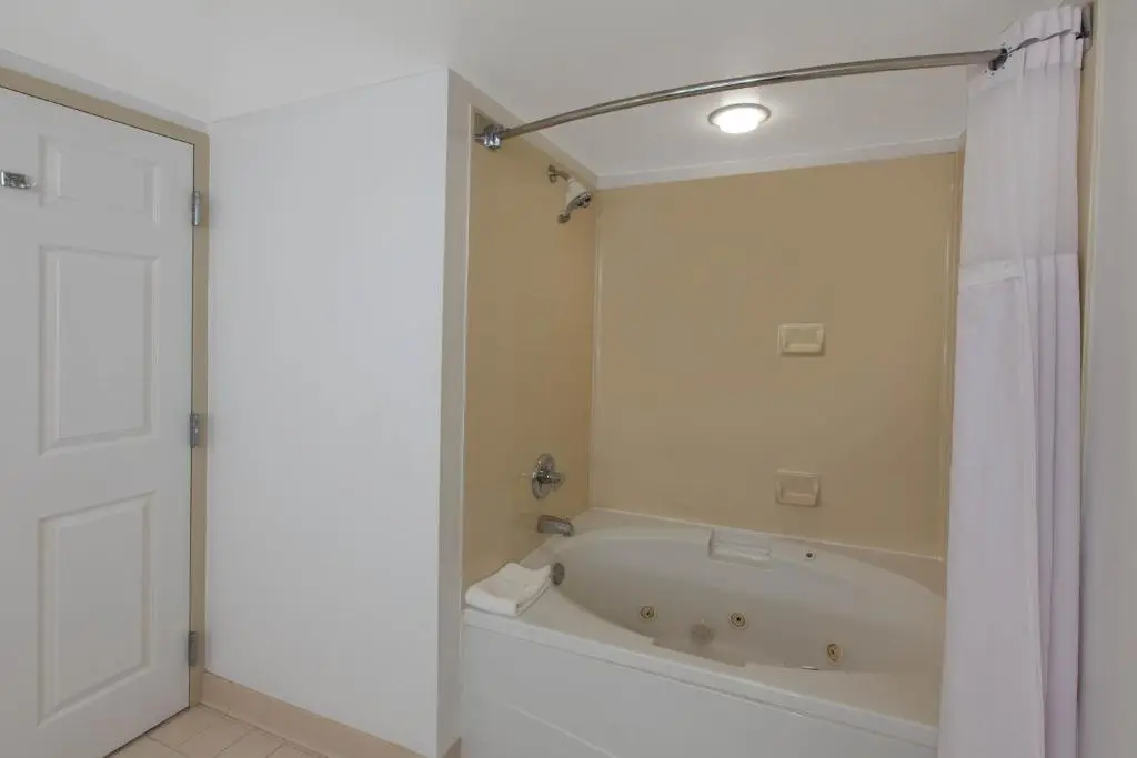 Private in-room jacuzzi tub in the Deluxe king Studio Suite, Non-Smoking at Hawthorn Suites by Wyndham Oklahoma City Airport Fairground