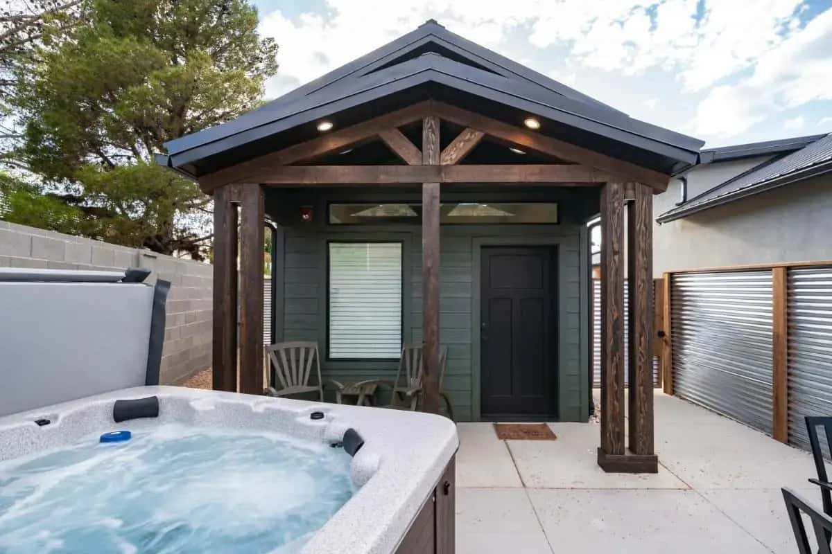 a hot tub on the patio of a house at Zion Oasis Rentals in Hurricane
