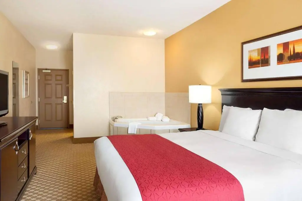 In-room hot tub at Country Inn & Suites by Radisson, Conway, AR in Conway, AR